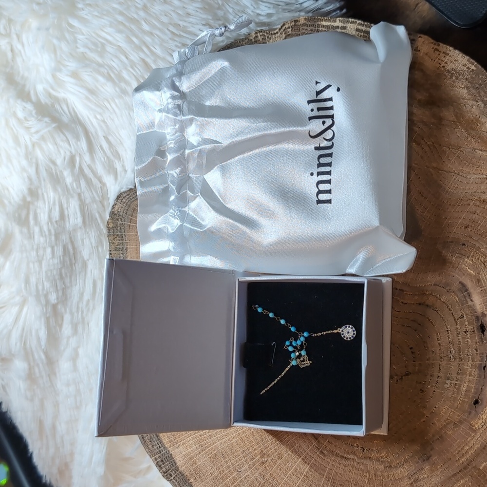 Elegant Gold Necklace with Sapphire Turqioise Accents and Evil Eye Design - Picture 9 of 12